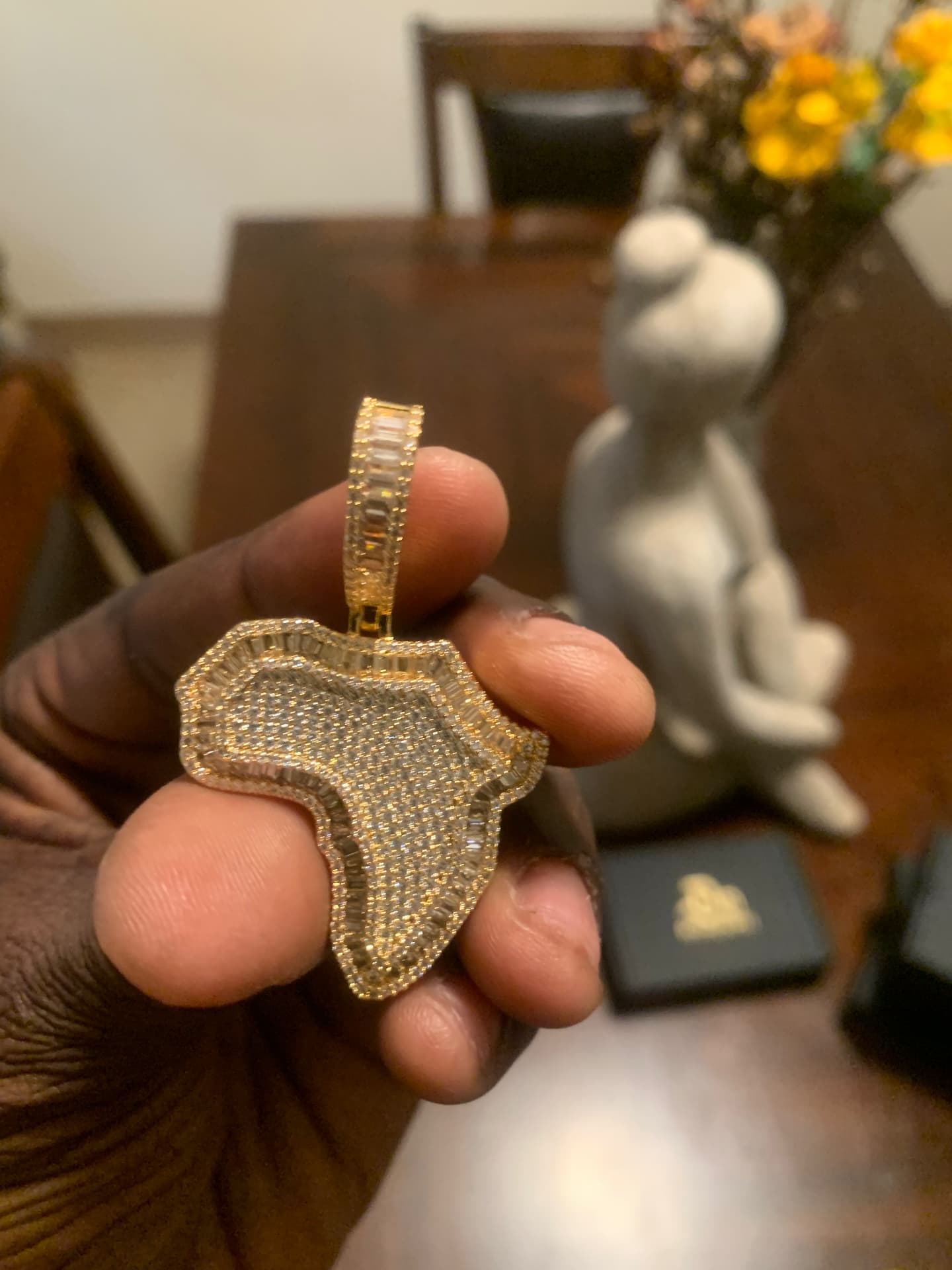 Gold-tone iced Africa pendant