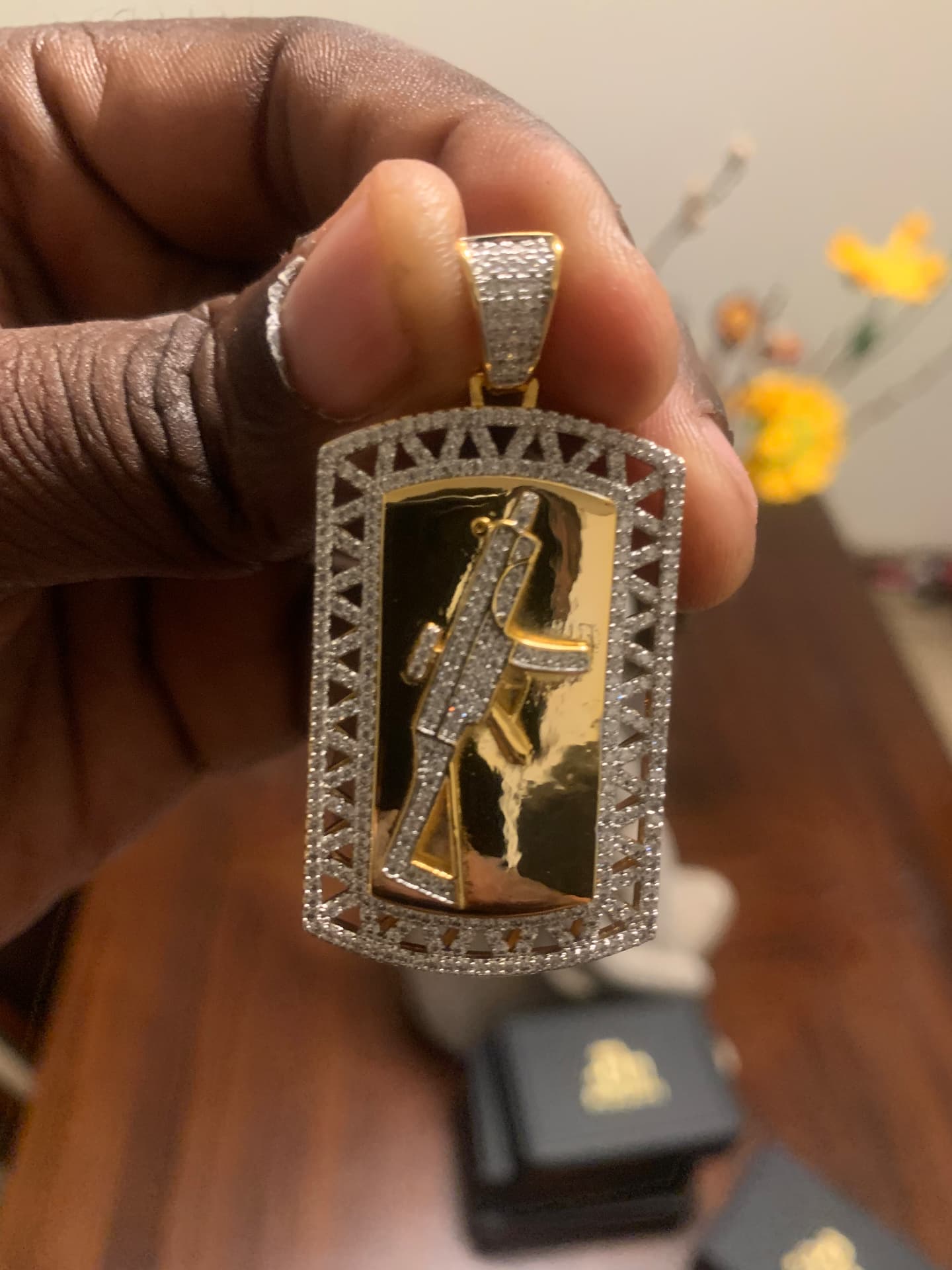 Close view of the iced rifle dog tag
