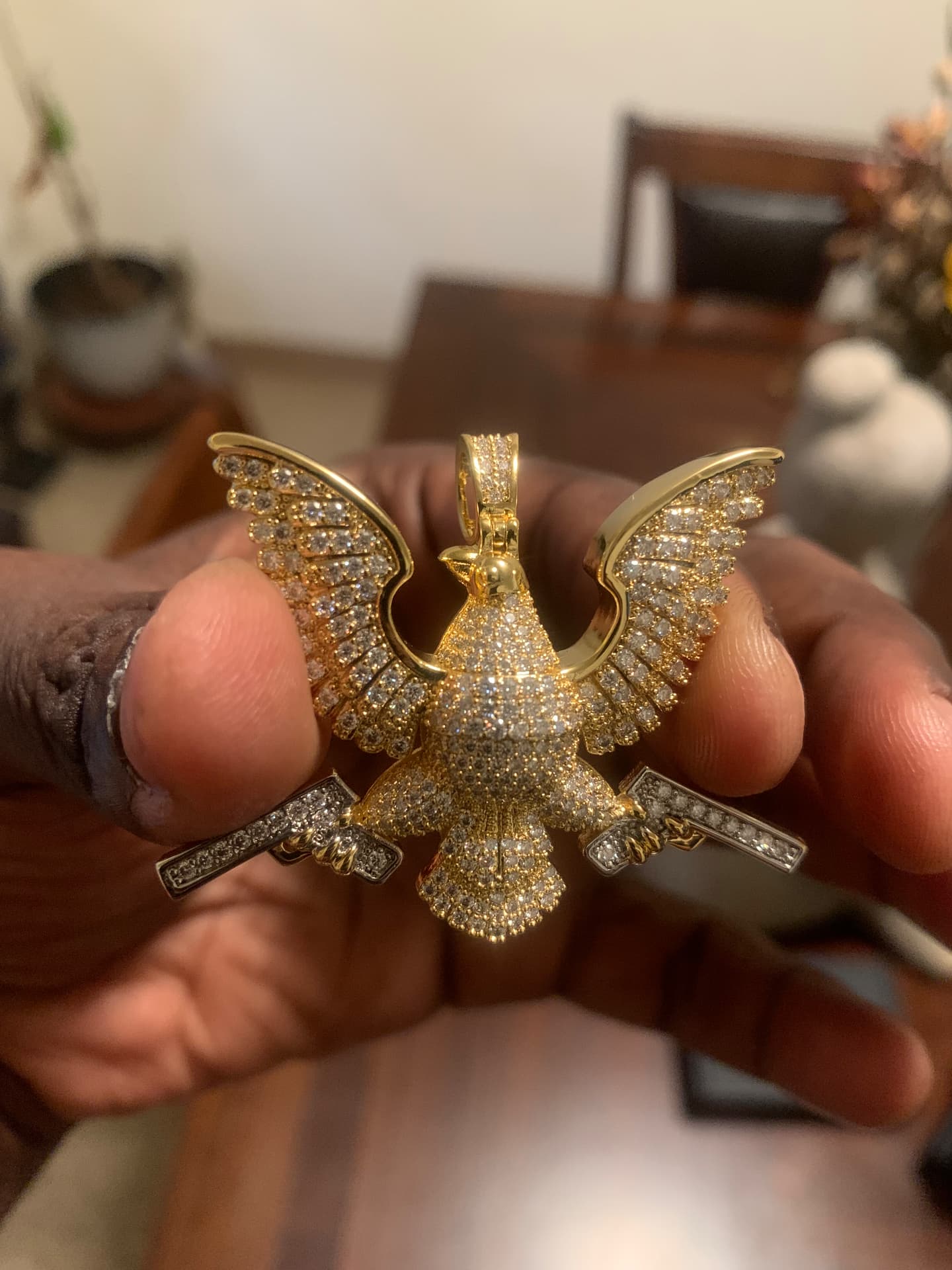 Close view of the iced eagle pendant