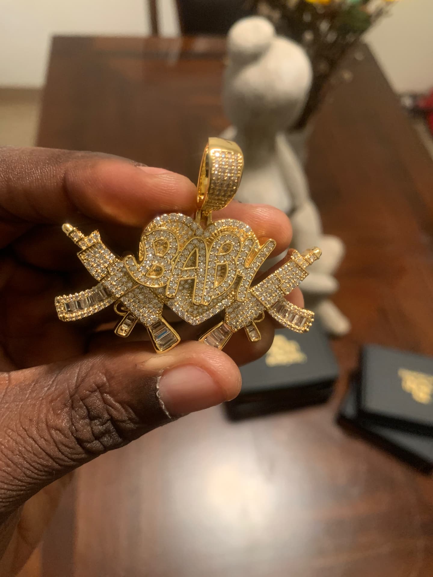Gold BABY heart pendant with crossed rifles