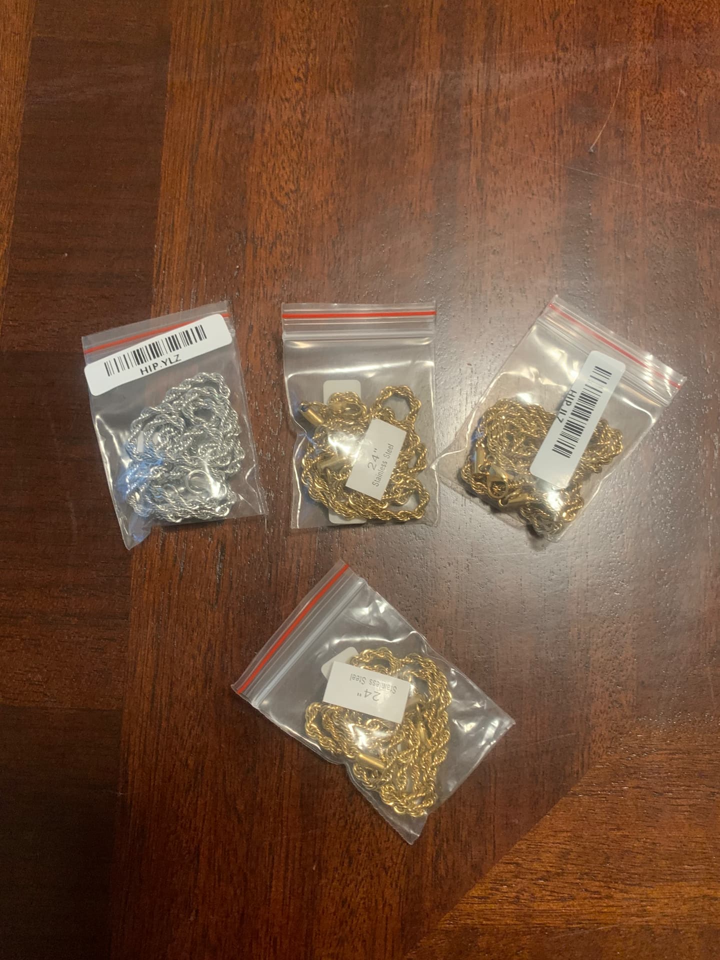 Collection of packaged 22-inch rope chains