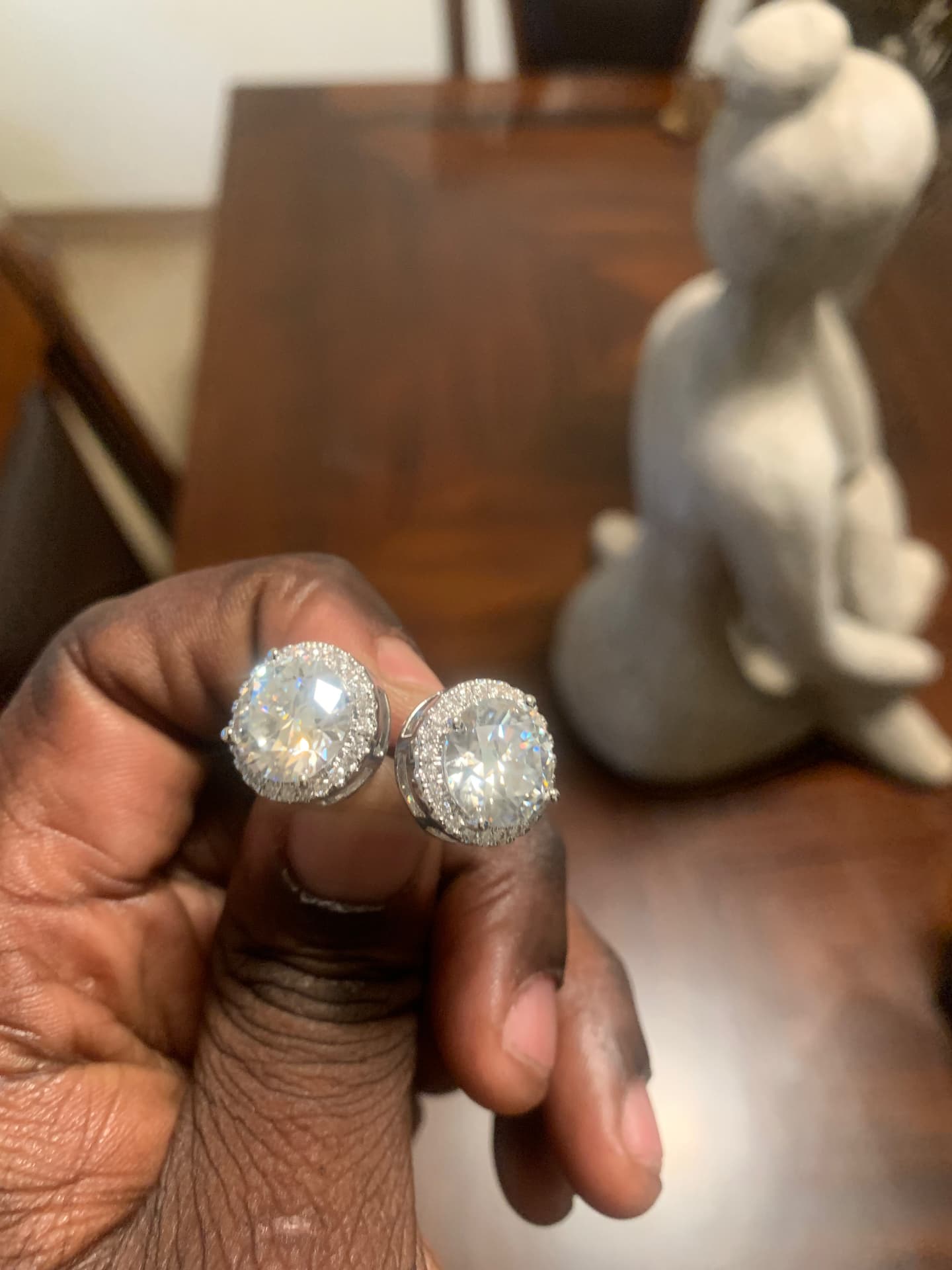 Pair of large round moissanite halo stud earrings
