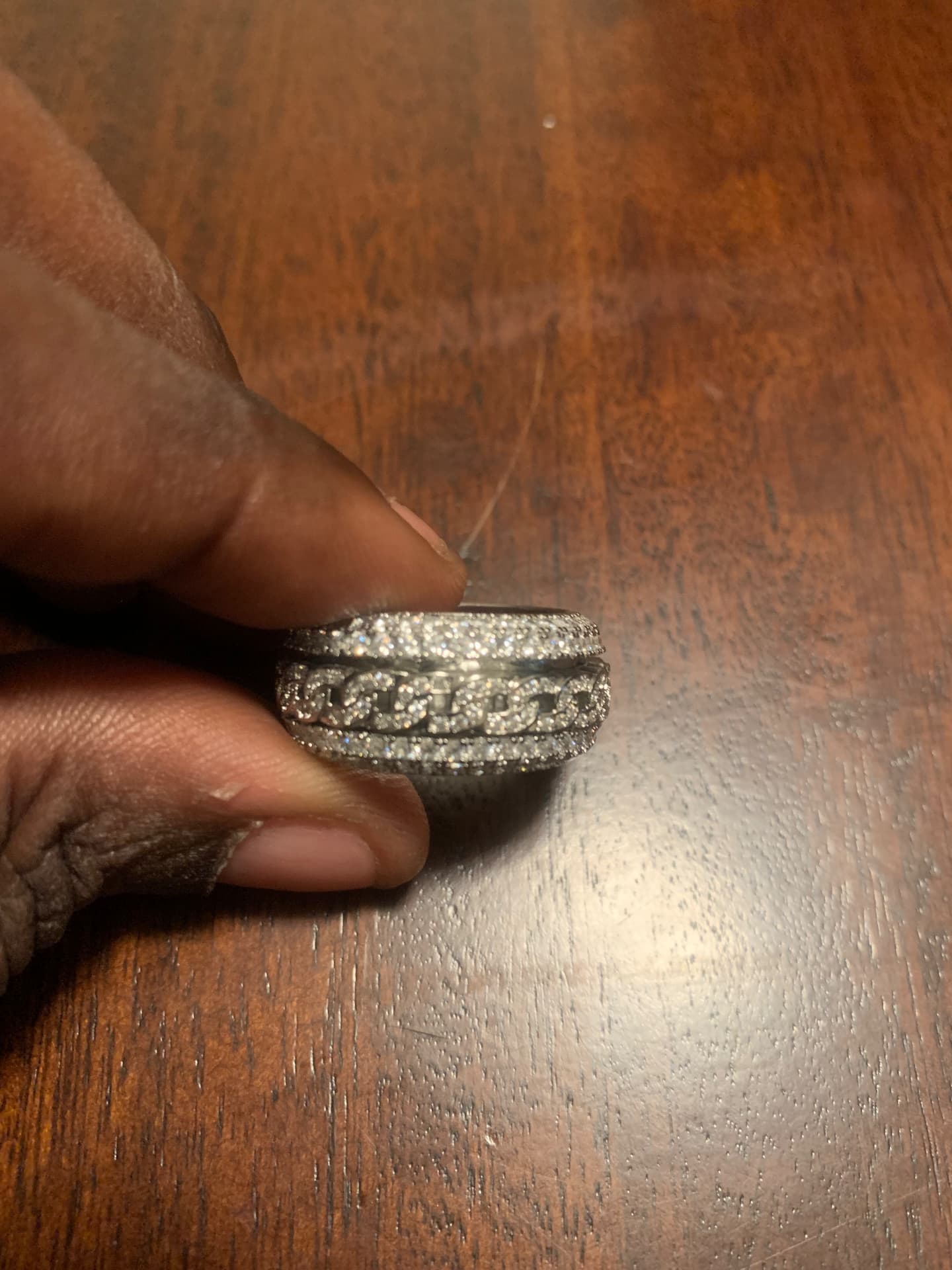 Side view of the iced moissanite link band